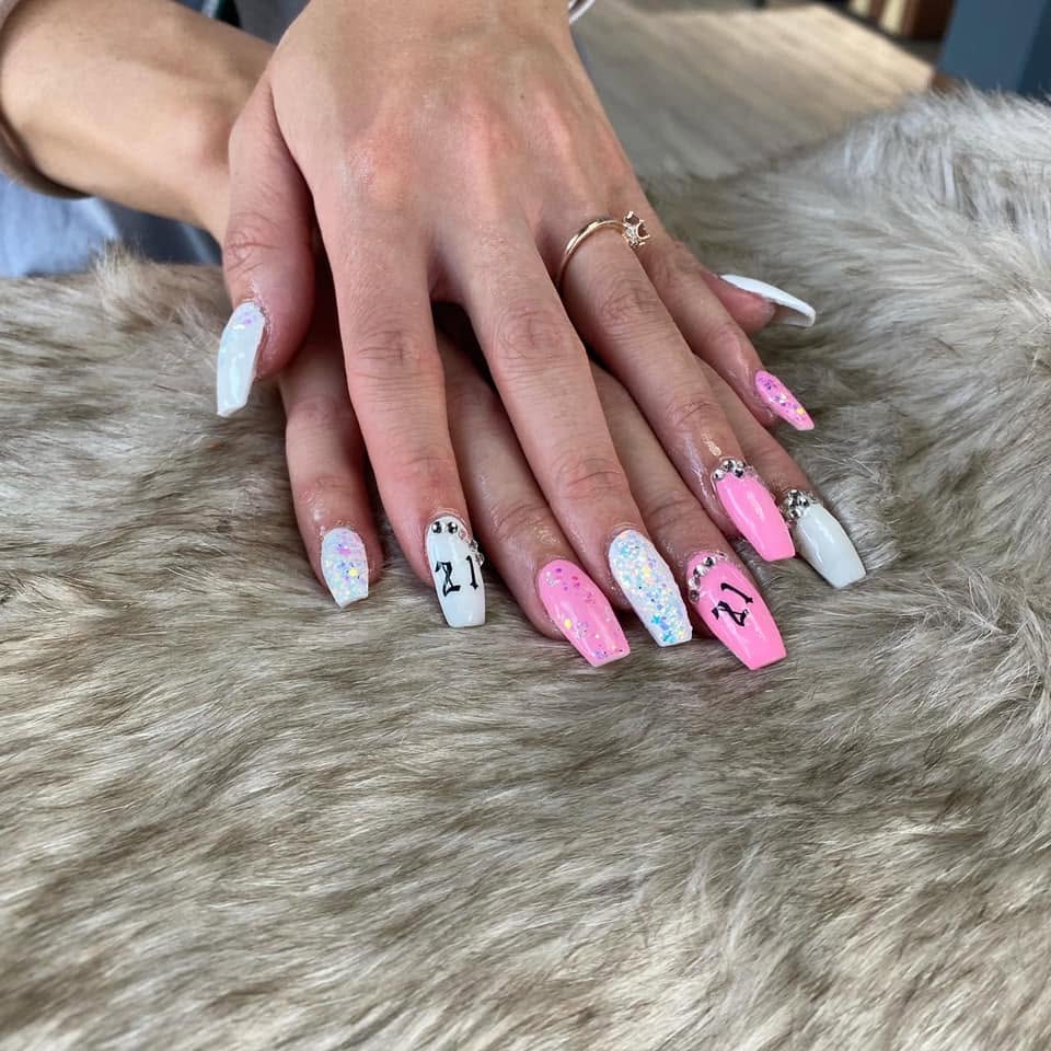 Pink and white 21st birthday nail set with glitter at Pleasant Nails & Spa