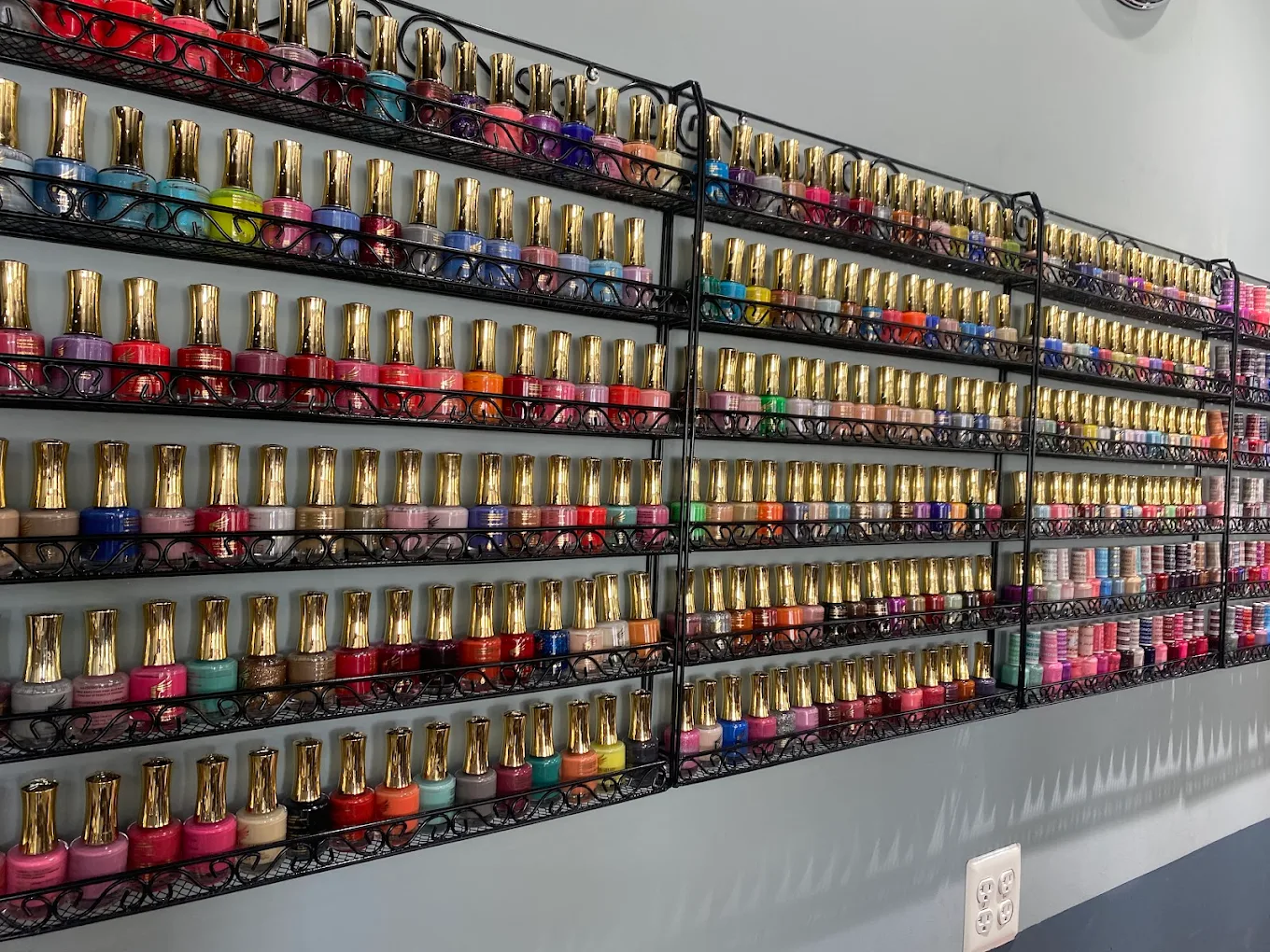 Wall of nail polish colors at Pleasant Nails & Spa in Grand Rapids